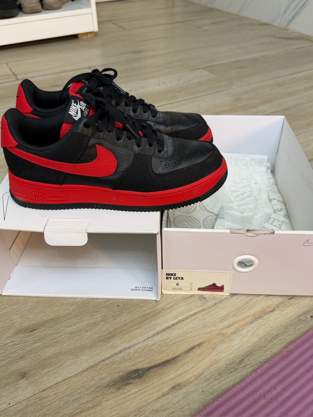 Nike Air Force 1 Low in Black/Red size 9